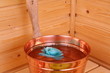 Bucket with water in sauna Bucket with water in sauna