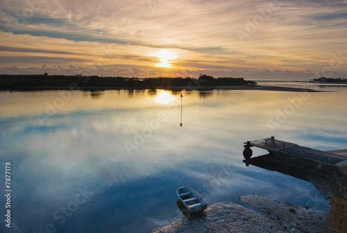 Photo: Winter Sunrise over a Glassy River with Boat and Jetty Winter Sunrise over a Glassy River with Boat and Jetty