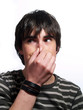Attractive guy is holding his nose