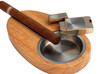 close up of ashtray, lighter and cuban cigar