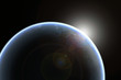 Sun emerging over planet earth