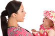 Foto: A mother teaches his daughter to speak A mother teaches his daughter to speak