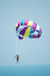 ����: Multi coloured parachute over the blue sky � Elnur #7957121