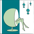 femme turquoise dans fauteuil boule