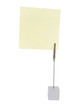 Clamp holding three post-it's.