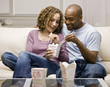 Young couple eating take-out food Young couple eating take-out food