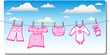 baby girl clothing hanging on the clothes line with clouds