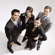 Young business people posing