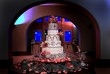 Six tiered wedding cake with pink orchids