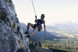 A climber abseiling