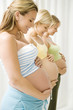 Three pregnant women
