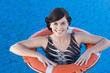 A young woman wearing a lifebelt