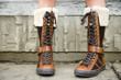 A teenager wearing boots