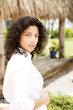 portrait woman standing in tropical garden