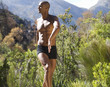 Bare chested young man practicing yoga