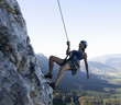 A climber abseiling
