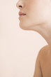 Detail of young woman's face showing chin, nose and mouth