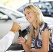 A young woman buying a new car