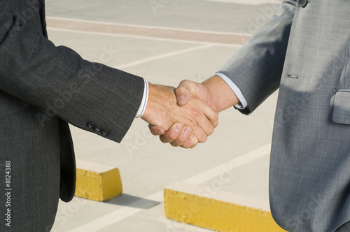 Photo: Two businessmen shaking hands Two businessmen shaking hands