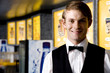 Smartly dressed usher at the cinema