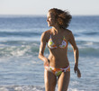 A woman running on the beach