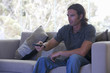 A man using a remote control