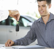A young man buying a new car