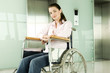 A woman sitting in a wheelchair