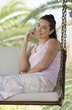 A woman chatting on a mobile phone