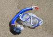 A snorkel mask and tube