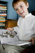 boy looking at book