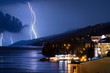 Small city near the ocean at stormy night Small city near the ocean at stormy night