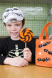 Little boy with trick or treat sweets