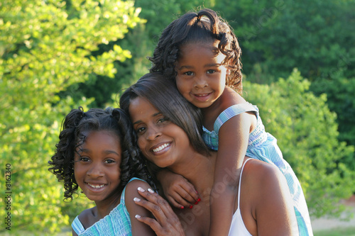 Photo: A woman and her daughters A woman and her daughters