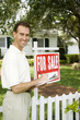 Estate agent outside property for sale
