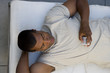 Man with MP3 player, overhead view