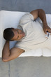 Man with MP3 player, overhead view