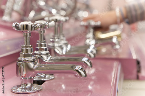 Photo: Man shopping in hardware store, close-up of hand Man shopping in hardware store, close-up of hand