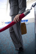 Businesswoman next to velvet rope in airport