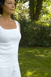 A mature woman in a park.
