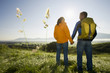 Photo: A couple holding hands. A couple holding hands.