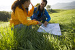 A couple reading a map.
