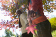 Close up of woman holding autumn leaf