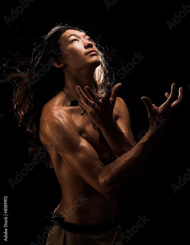 Photo: Sporty man posing artistic Sporty man posing artistic
