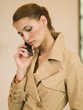A young woman talking on her mobile phone.