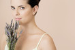 Woman holding a bunch of dried lavender