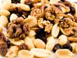 Close Up Walnuts Peanuts and Dried Fruit on White Background