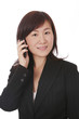 Asian Businesswoman With Mobile Phone
