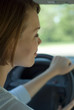 young woman driving a car