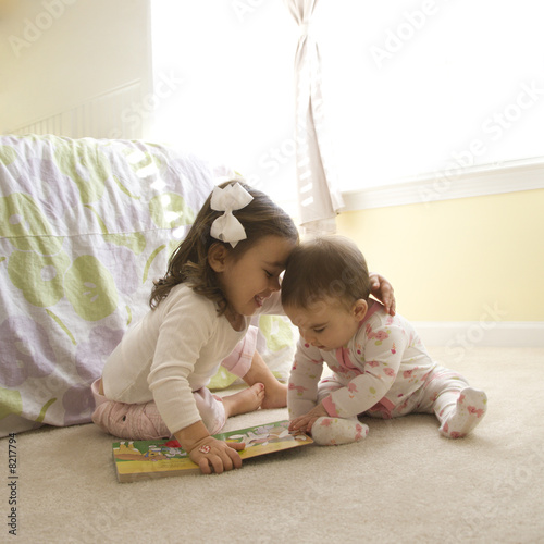 Photo: Girls with book. Girls with book.